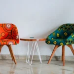 Two colourful chairs and a small table